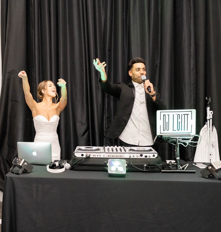 DJ hyping the crowd with the bride.