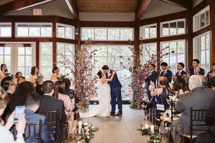 Bride and Groom kissing during the ceremony at Loeb Boathouse Central Park.