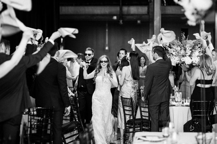 Fun wedding reception entrance with great energy.