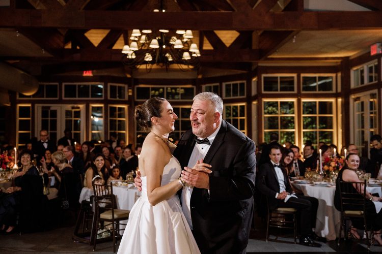 Sweet father daughter dance moment at the wedding reception.