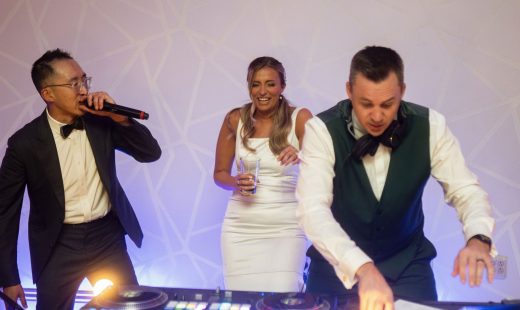 Wedding DJ vs Playlist: Why a Professional DJ Is Worth It