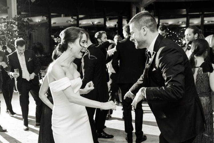 Joyful wedding dance moment, full of connection.